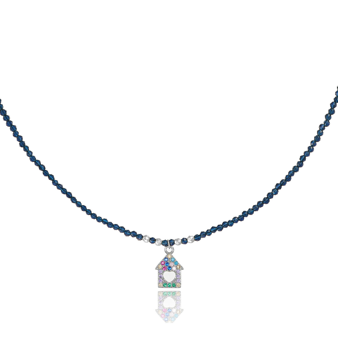 Collana con cristalli blu e casetta zirconata in acciaio