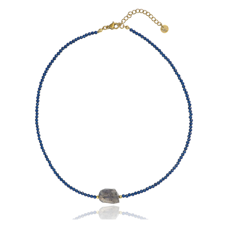 Collana con centrale in iolite e cristalli blu in acciaio dorato