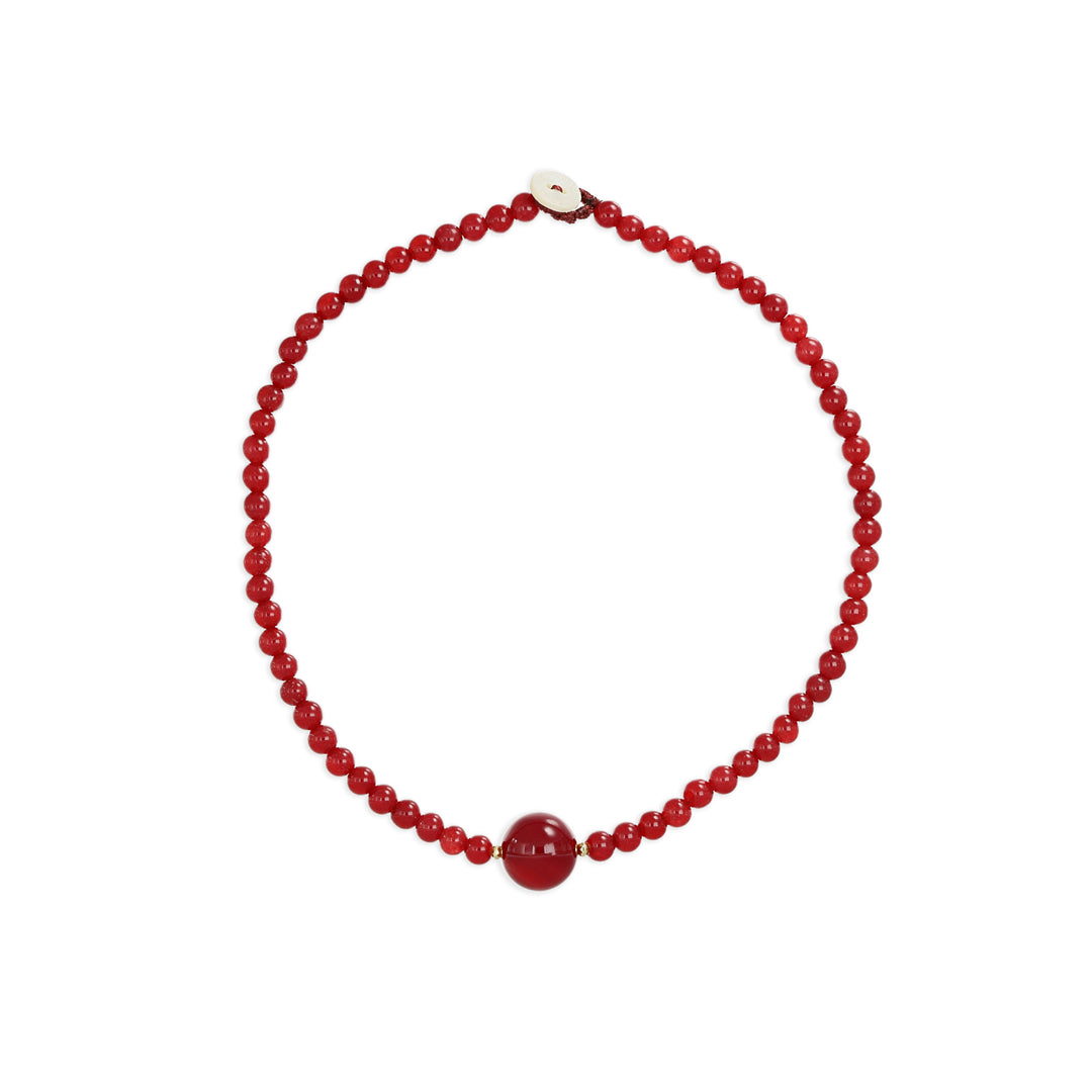 Collana in agata vinaccia con sfera centrale