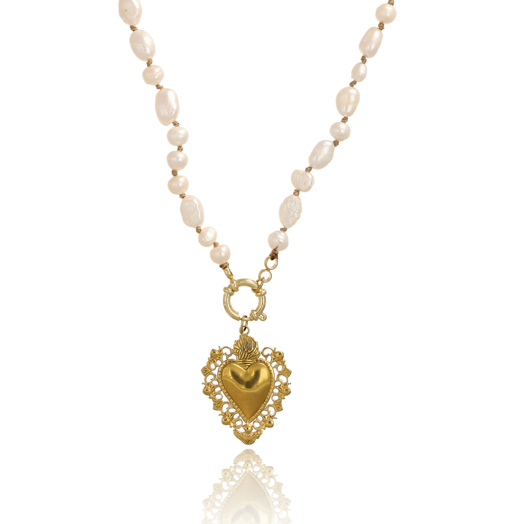 Collana nodini in perle di fiume con ex-voto e anello in acciaio dorato