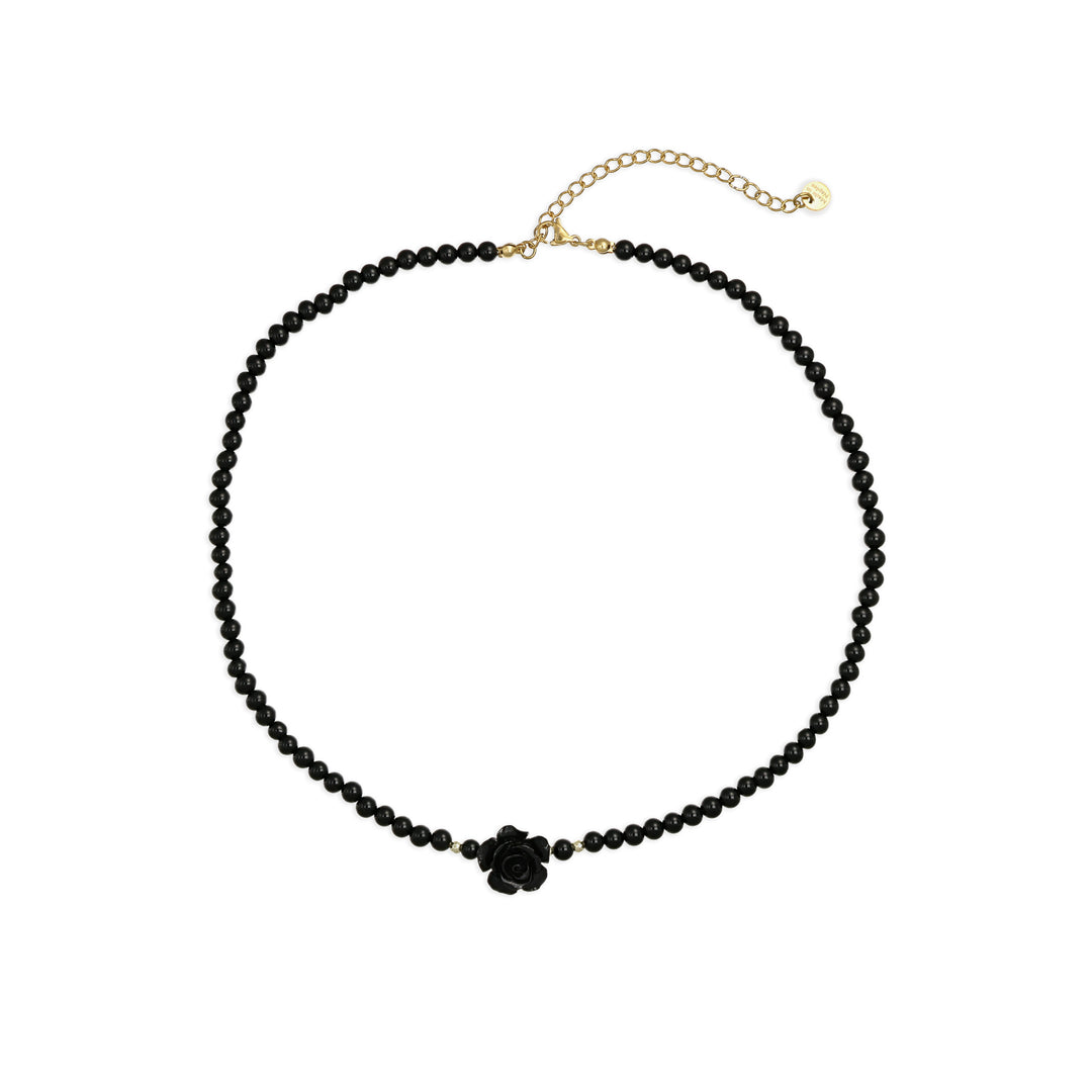 Collana in onice nero con rosa nera su acciaio dorato