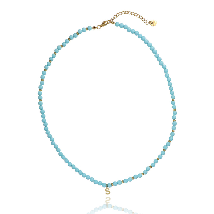 Collana in pasta di turchese con iniziale in argento 925‰ dorato
