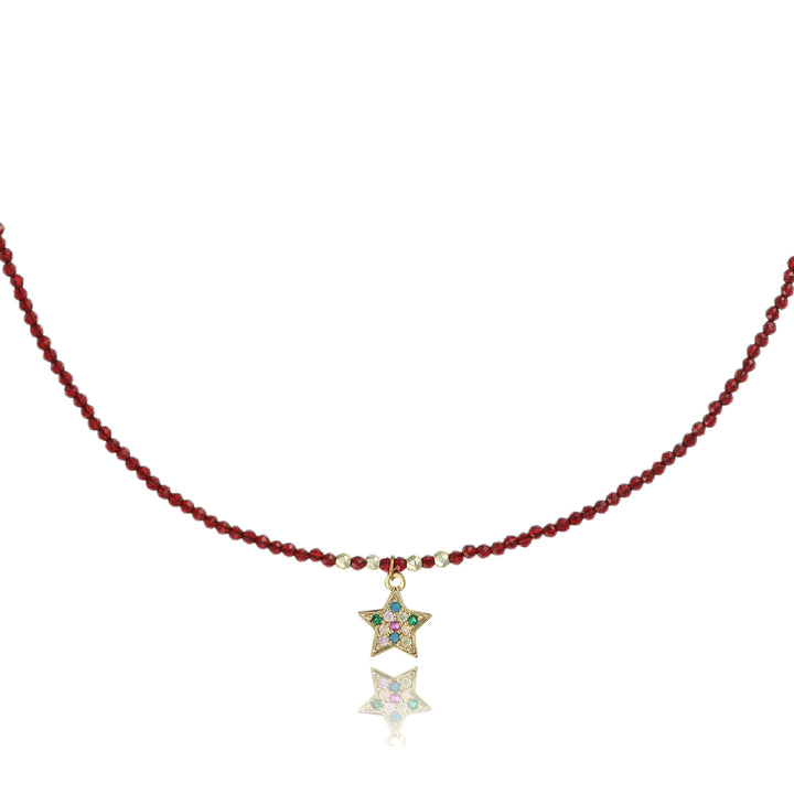 Collana con cristalli amaranto e stellina zirconata in acciaio dorato