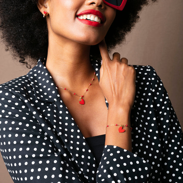 Collana con cuore rosso e iniziale in acciaio dorato