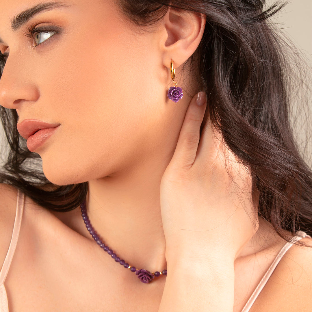 Cerchi con rosa viola in acciaio dorato