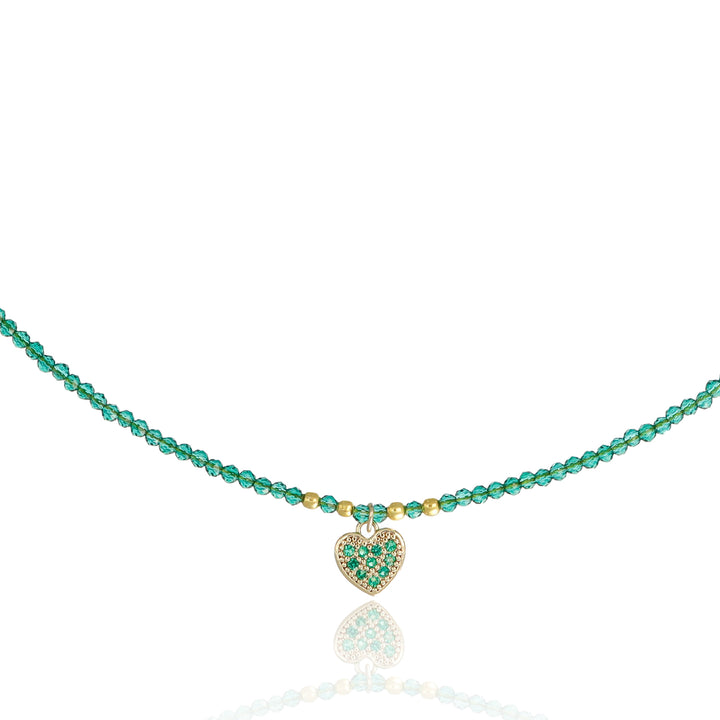 Collana con cristalli verde e cuoricino zirconato in acciaio dorato